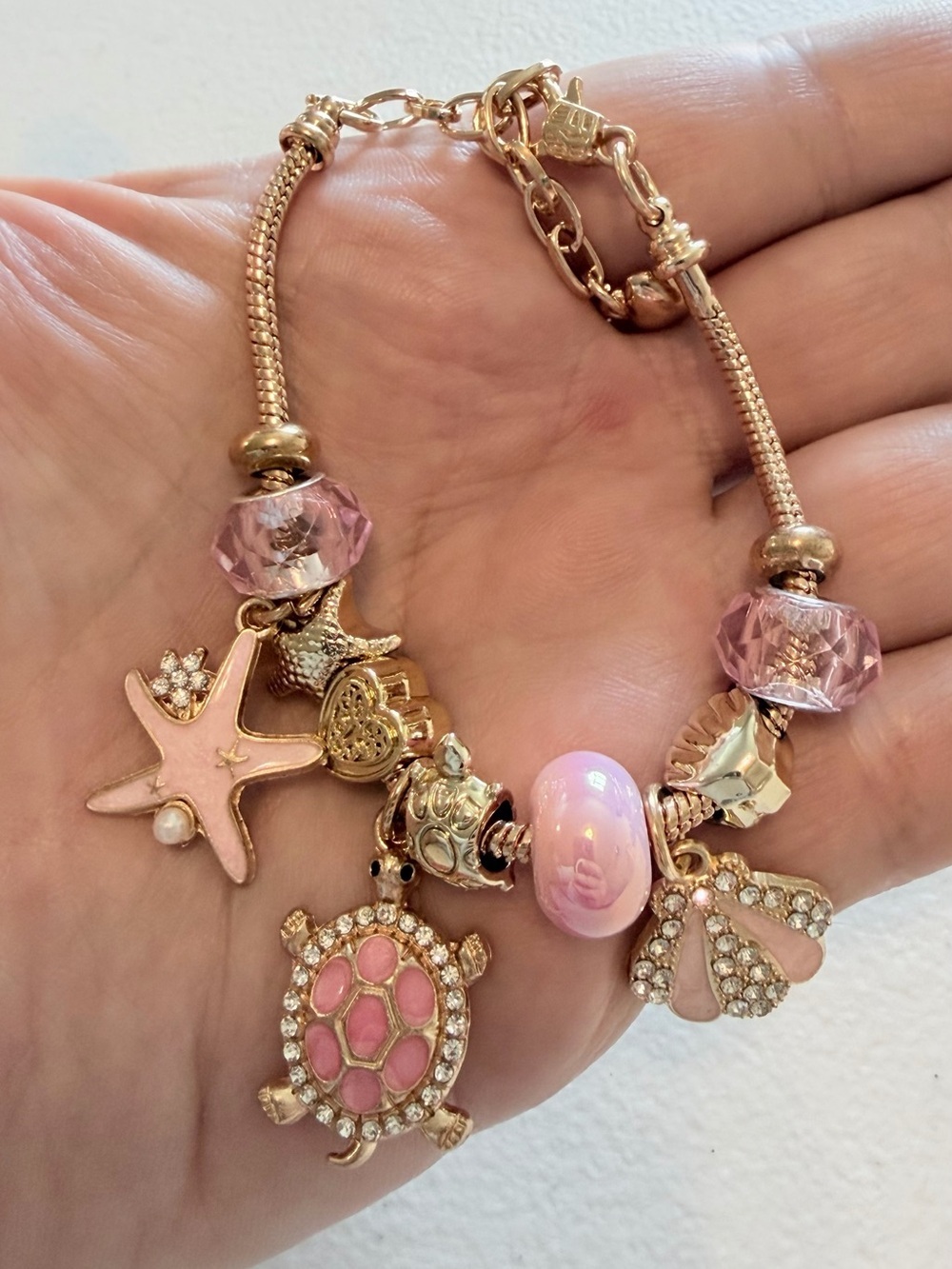 Gold-Tone Pink Sea Charm Bracelet. - Picture 3 of 8